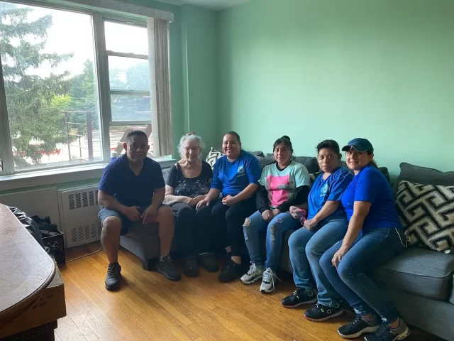 Home Cleaning Team with Customer